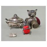 Pair of sterling silver cat pin cushions,
