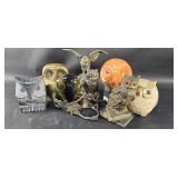 Group of owl figurines, a silver plate, a stone