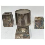 Group of four pottery barn candlestick holders