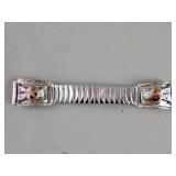 Vintage silver and stainless steel expansion