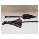 Pair of black Victorian petite parasols with