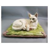 Composite cat figurine