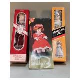 Group of porcelain dolls in original boxes