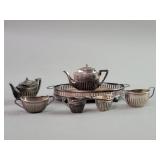 Seven piece sterling silver English miniature