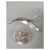 Pair of sterling silver brooches