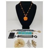 Group of designer jewelry with faceted beads,
