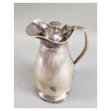 Antique silver pitcher with lid
