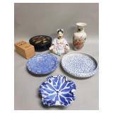 Group of Asian porcelain plates, vase, and