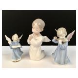 Trio of vintage porcelain angel figures