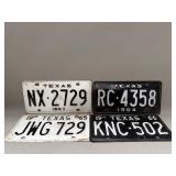 Group of four vintage Texas license plates