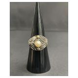 Sterling silver ring with ornate cabochon