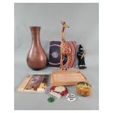 Ceramic vase, carved wood figure, wood trinket