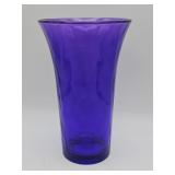 Vintage purple glass vase with wavy optic texture