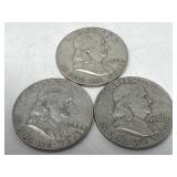 Three silver Franklin Half dollar coins