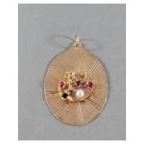 14k gold pendant adorned with rhinestones and