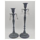 Pair of patinated brass candlesticks with h