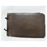 Antique journal with photographs