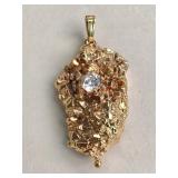 Gold-plated ï¿½nuggetï¿½ and diamond pendant