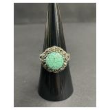 Vintage sterling silver ring with teal green stone