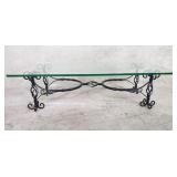 Contemporary wrought iron coffee table with glass