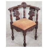 Renaissance-style carved mahogany corner chair
