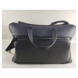 Tumi carry on bag with dust cover