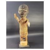 African carved wood and woven tribal figurine