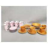 Group of ceramic plates, saucers , cups, bowls
