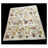 Large off-white pixilated-style area rug with