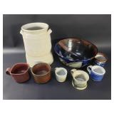 Group of vintage studio pottery mugs, jar, and