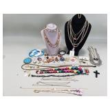 Group of costume jewelry, necklacess, rings,