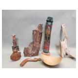 Group of carved wood totem poles, petrified w