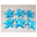 Group of blue glass art starfish dishes