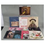 Twelve LP records/ 33rpms.