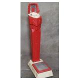 Mills Novelty Co. metal scale with key