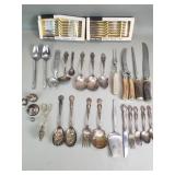 Group of silver plate and stainless steel flatware