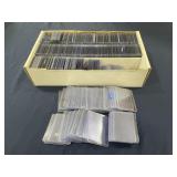 Large lot of sports cards hard sleeve top loaders