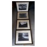 Bundle of framed photographs under glass
