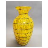 Vintage hand blown art glass vase featuring a