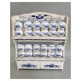 Vintage wood spice rack with ceramic spice shakers