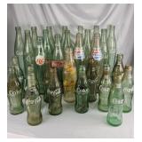 Vintage glass cola bottles: Coca-Cola, Pepsi,