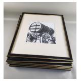 Bundle of framed photographs