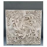 Swirling plaster on a panel wall art