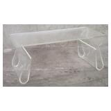 Umbra-styke acrylic coffee table with magazine