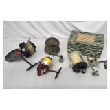 4 vintage fishing reels: Penn, Mitchell, Pflueger