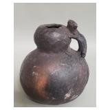 Primitive pottery gourd