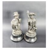 Pair of antique spelten statues on wood bases