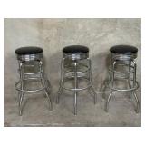 Three chrome & vinyl bar stools
