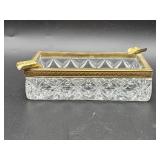 Hollywood Regency-style glass and embossed