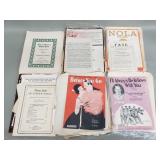 Box of vintage music sheets